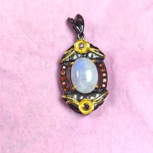 Elegant Moonstone Pendant with Vintage Gold & Red Gem Accents